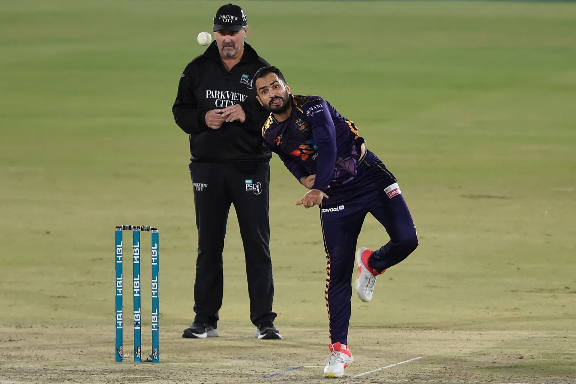 Mohammad Nawaz bowls during the Pakistan Super League.jpg
