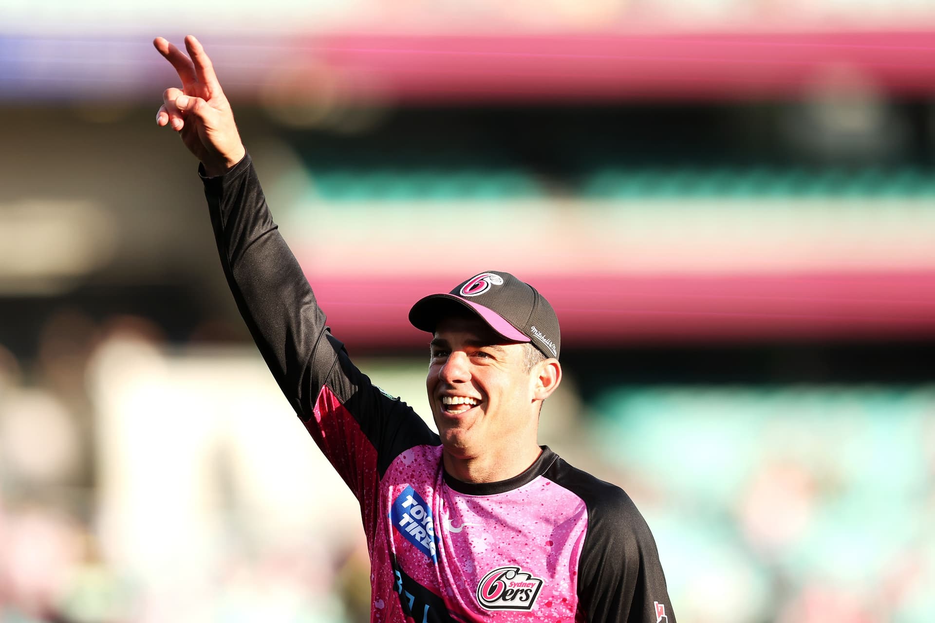 Moises Henriques of the Sixers gestures to the crowd during the warm -up.jpg