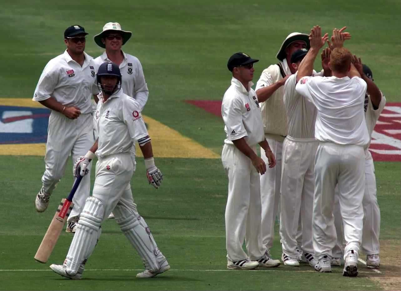Nasser Hussain of England is bowled for 16 runs by Shaun Pollock of South Africa