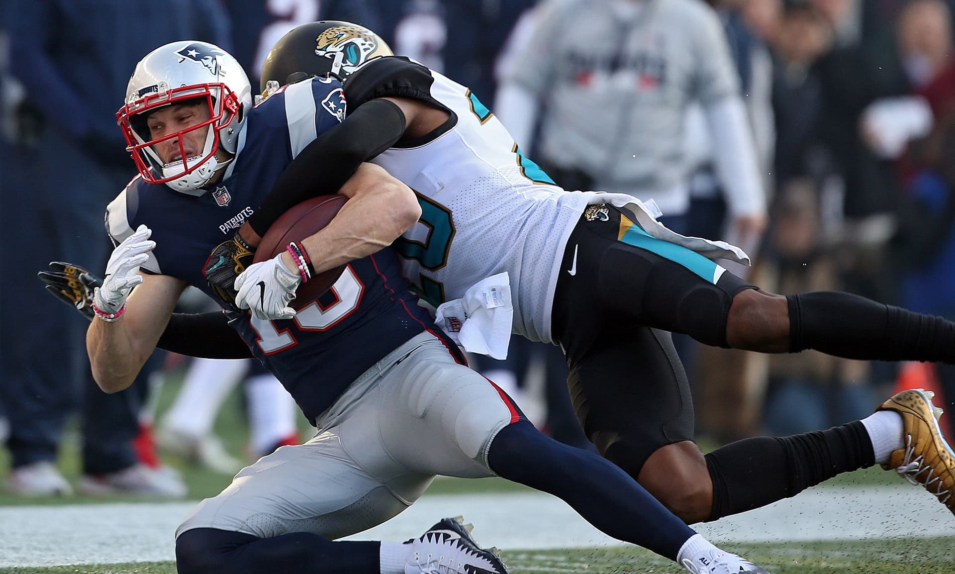 Chris Hogan is pushed out of bounds by Jalen Ramsey