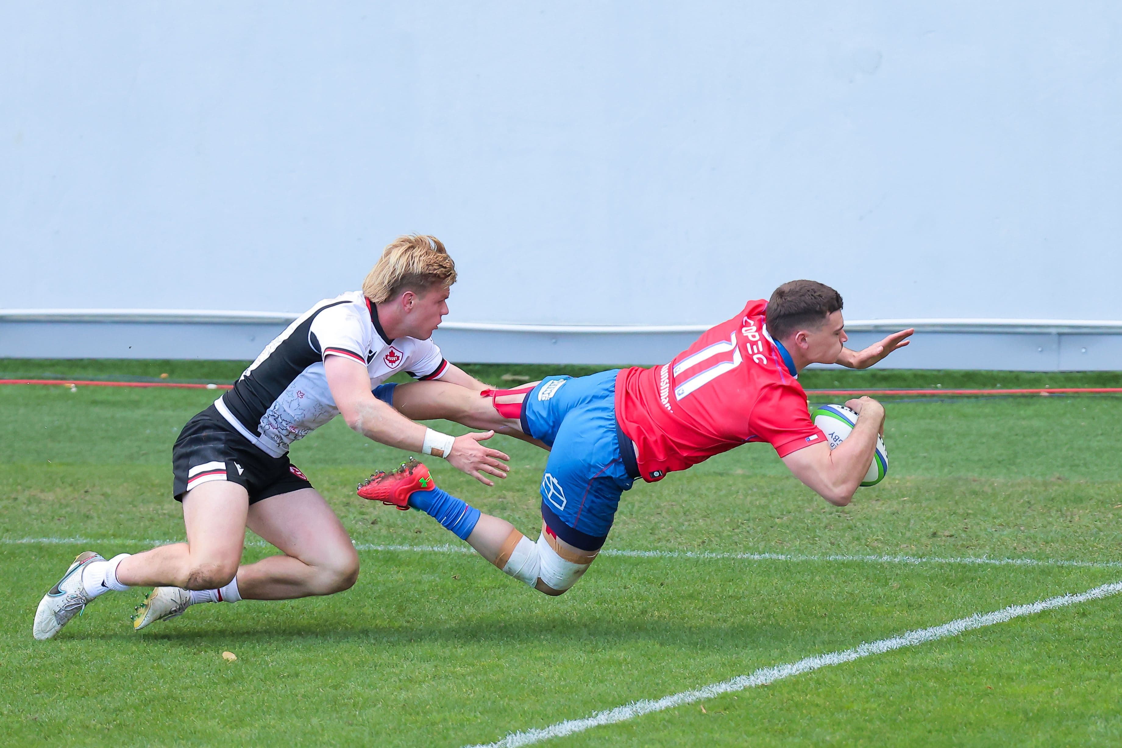 Nicolas Garafulic (R) of Chile scores a try during the Autumn International Series
