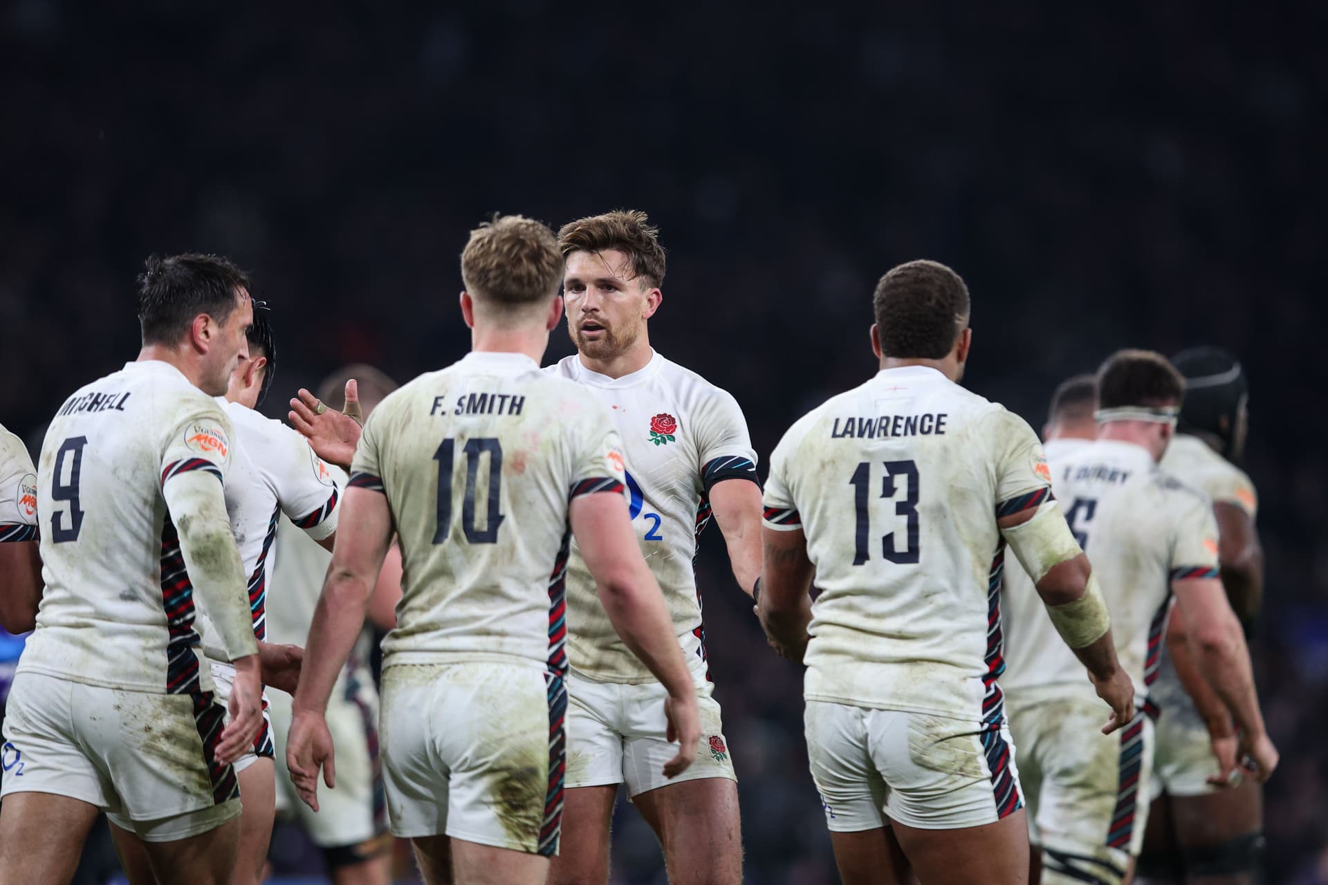 Ollie Lawrence celebrates England's first try with Henry Slade.
