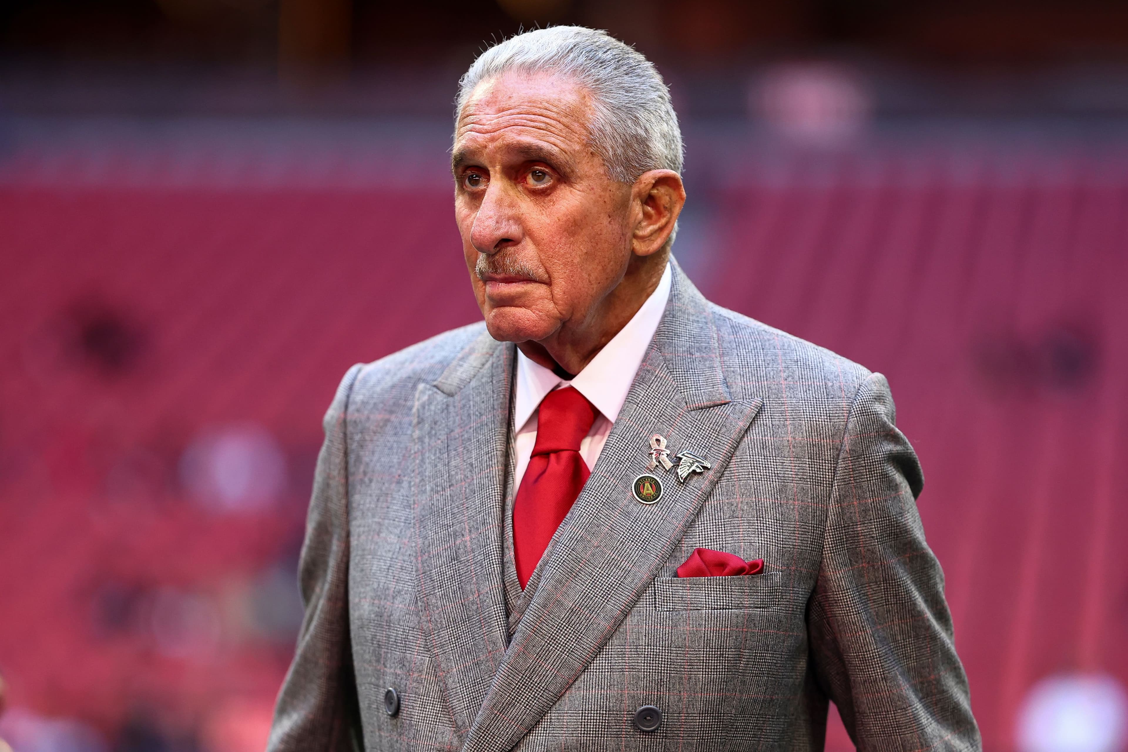 Owner Arthur Blank of the Atlanta Falcons stands on the field prior to an NFL football game