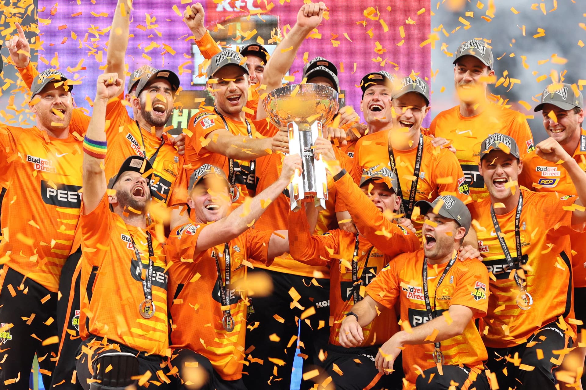 Perth Scorchers players celebrate with the trophy after winning the Big Bash League (BBL).jpg