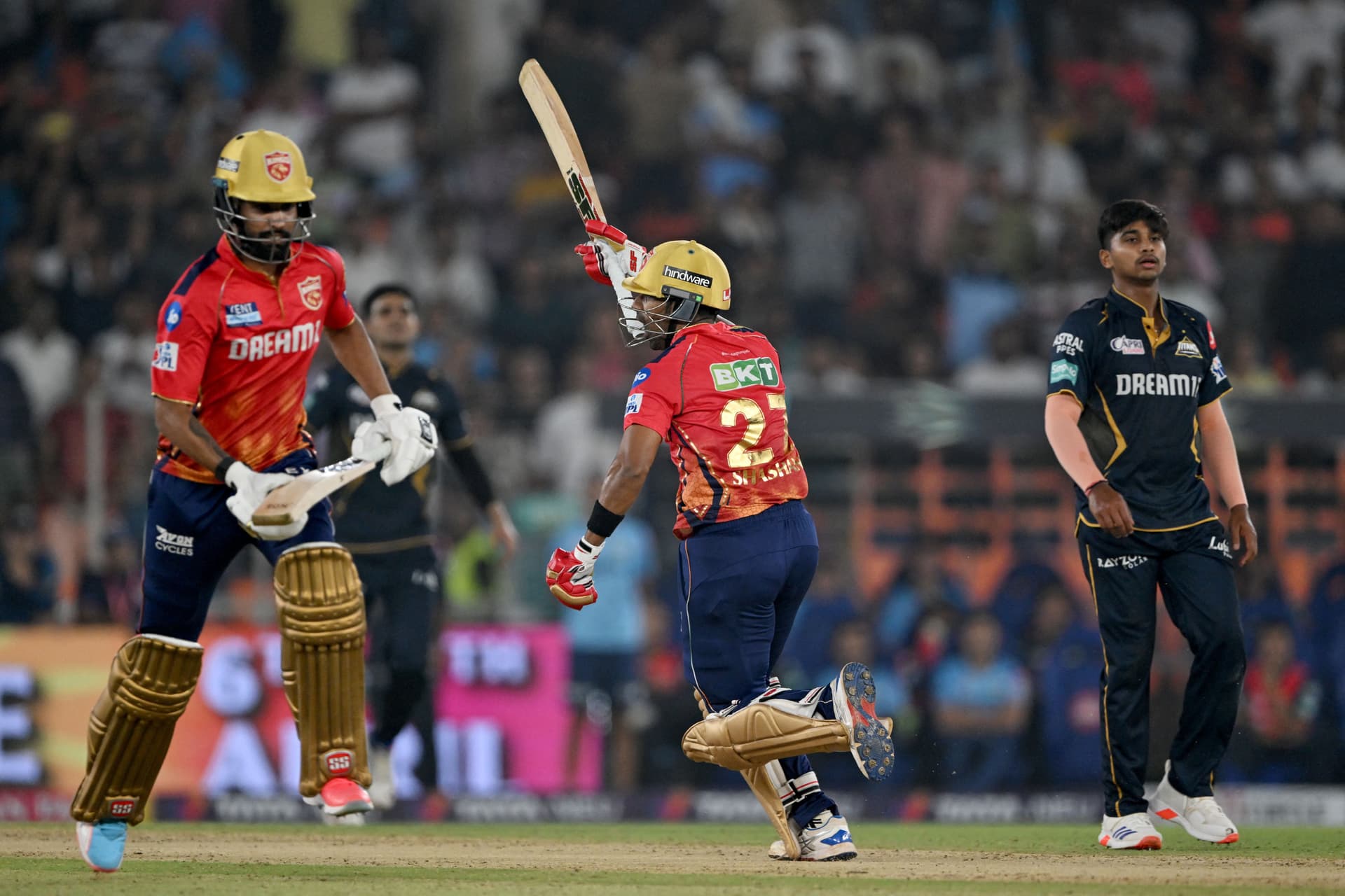 Punjab Kings' Shashank Singh and Harpreet Brar celebrate their win