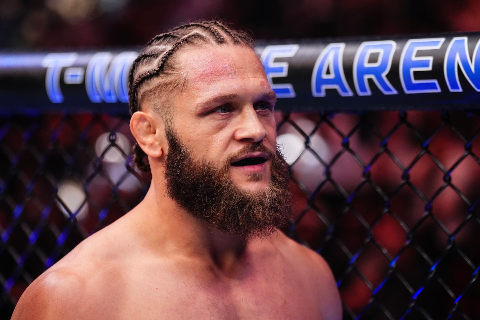 Rafael Fiziev of Kazakstan enters the Octagon