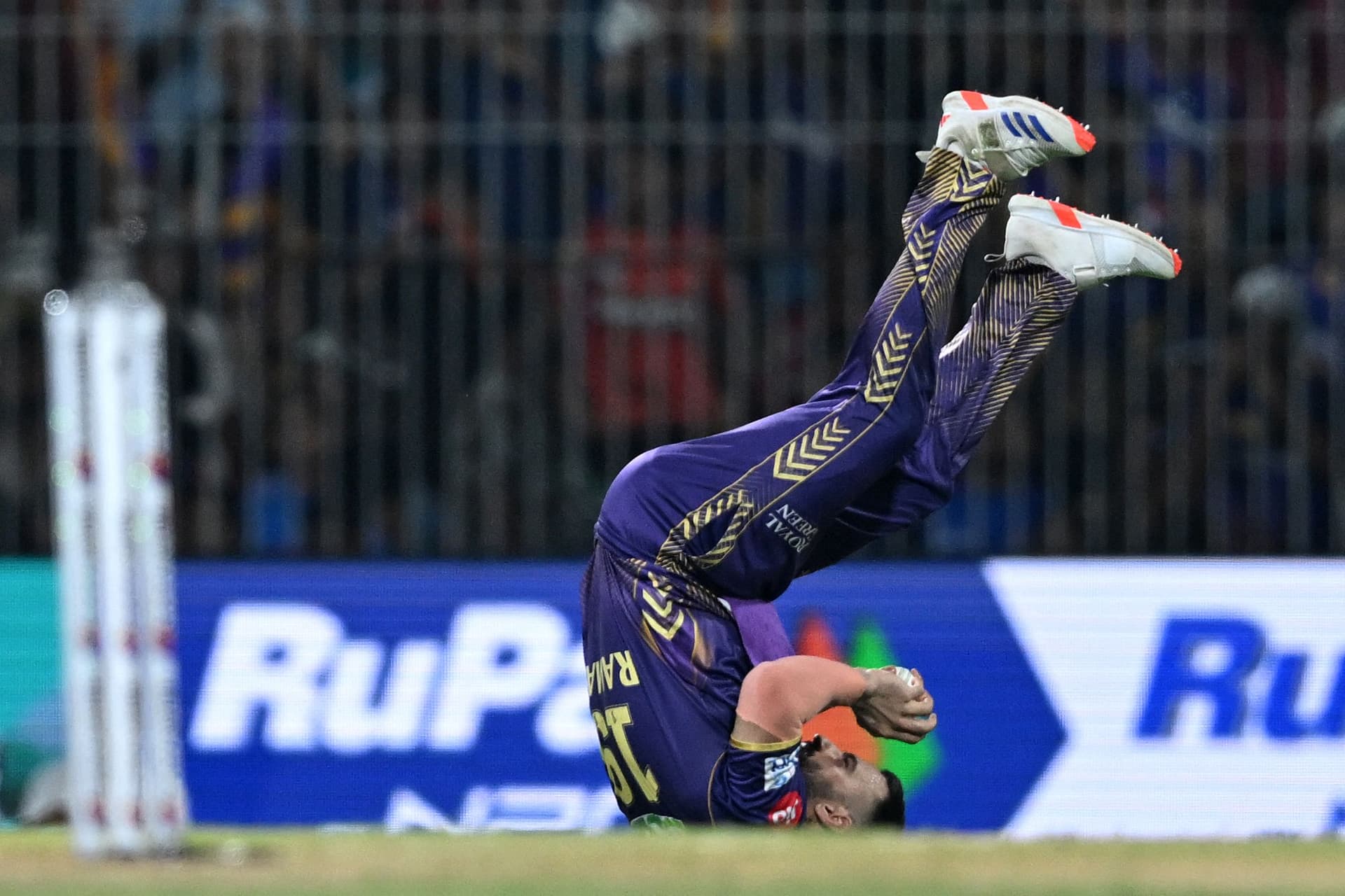 Ramandeep Singh takes the catch to dismiss Rahul Tripathi