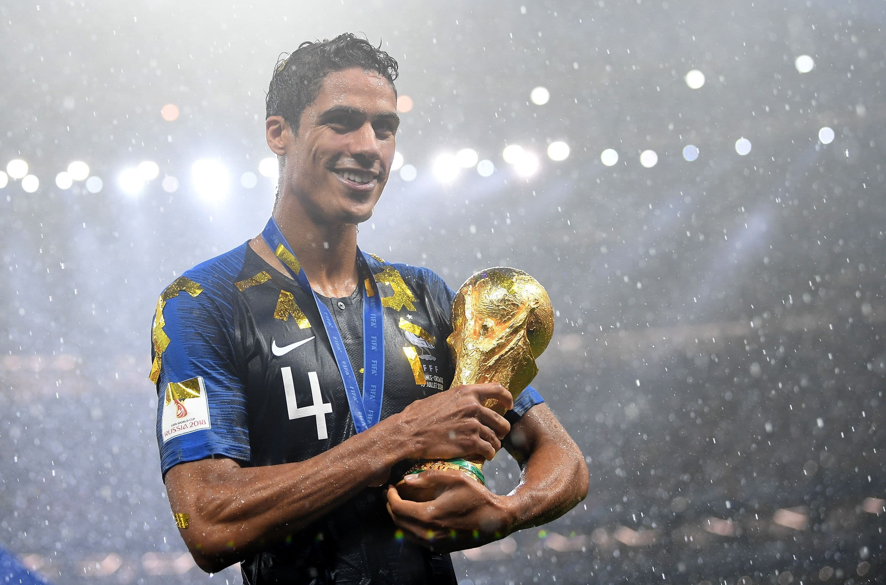 Raphael Varane of France celebrates with the World Cup trophy