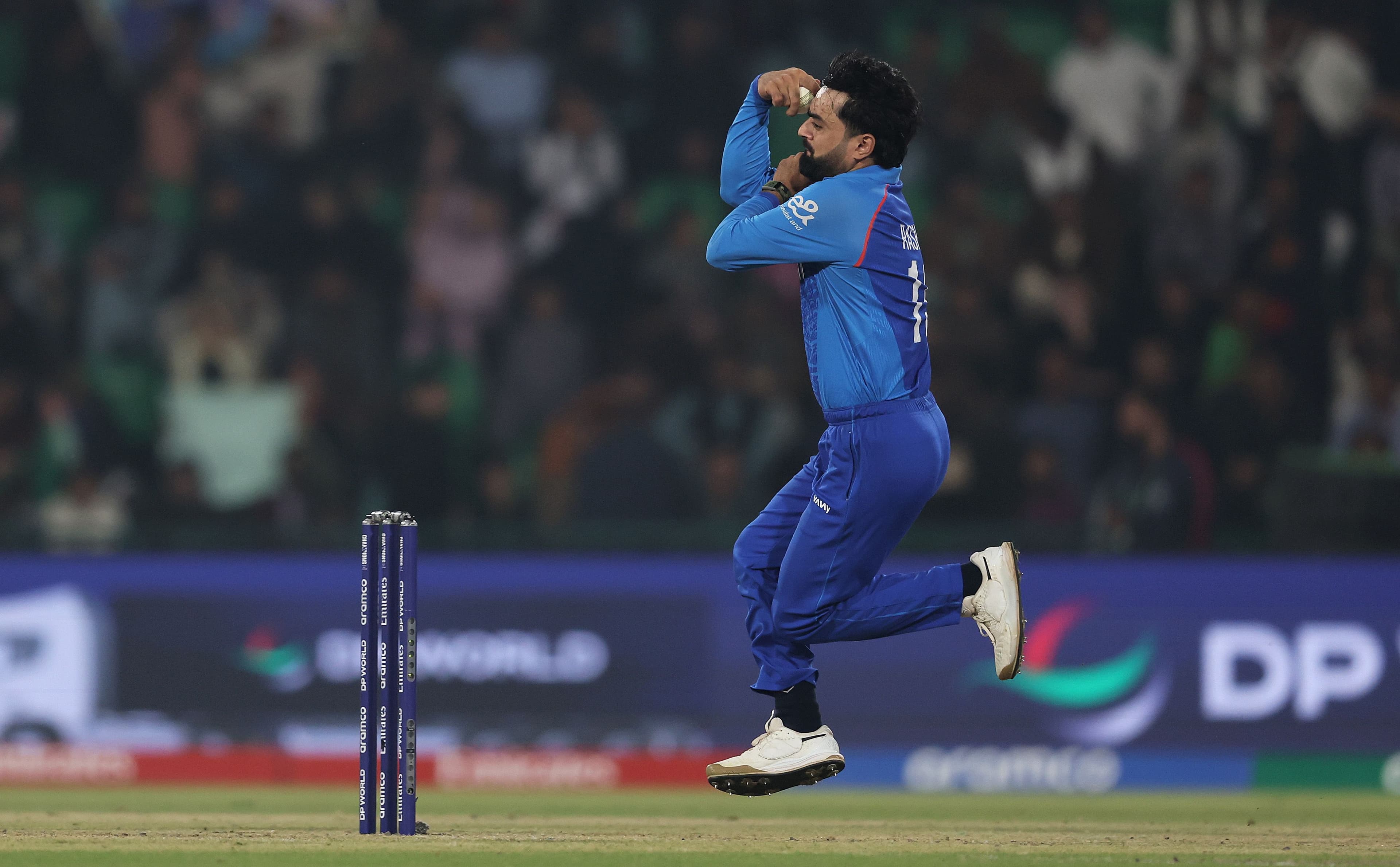 Rashid Khan of Afghanistan bowls during the ICC Champions Trophy 2025 match