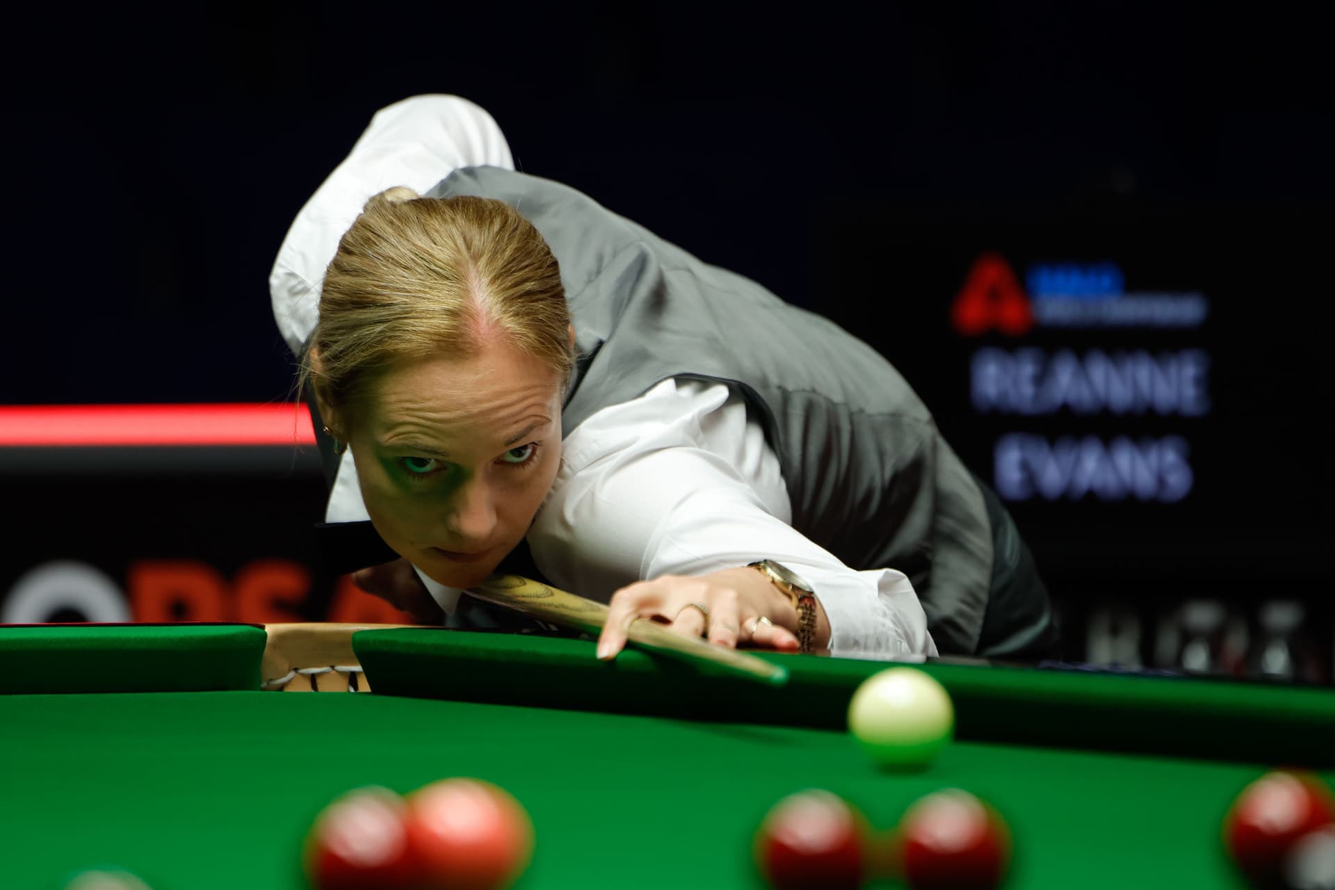 Reanne Evans of England plays a shot in the first round