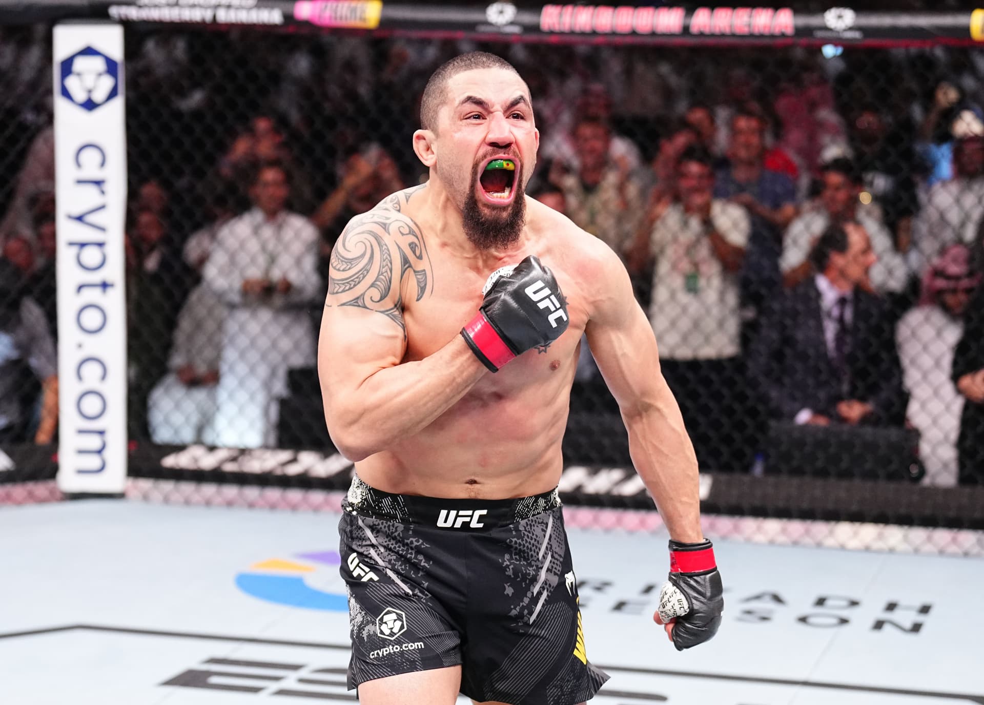Robert Whittaker of New Zealand reacts after his victory