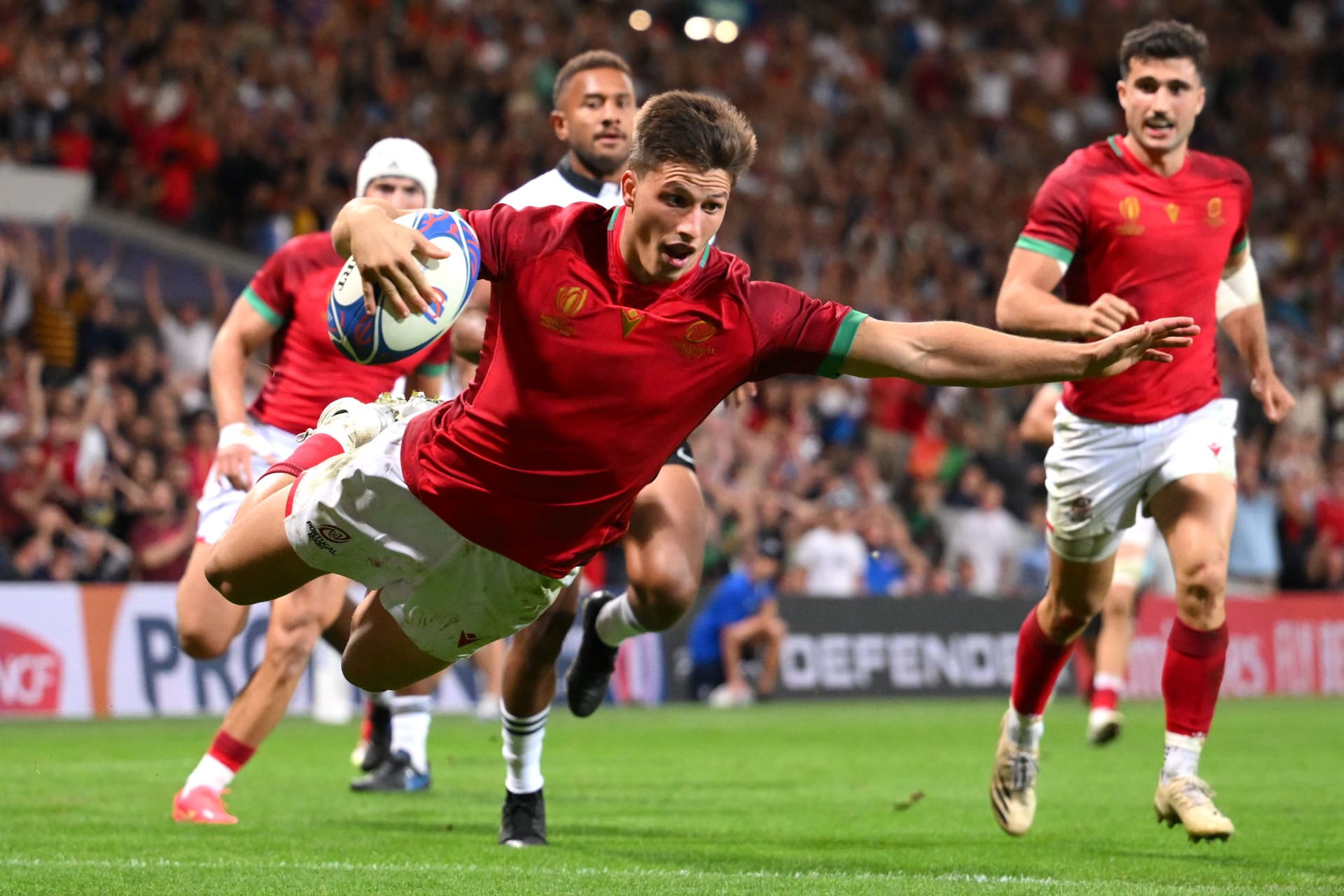 Rodrigo Marta of Portugal scores his team's third try during the Rugby World Cup
