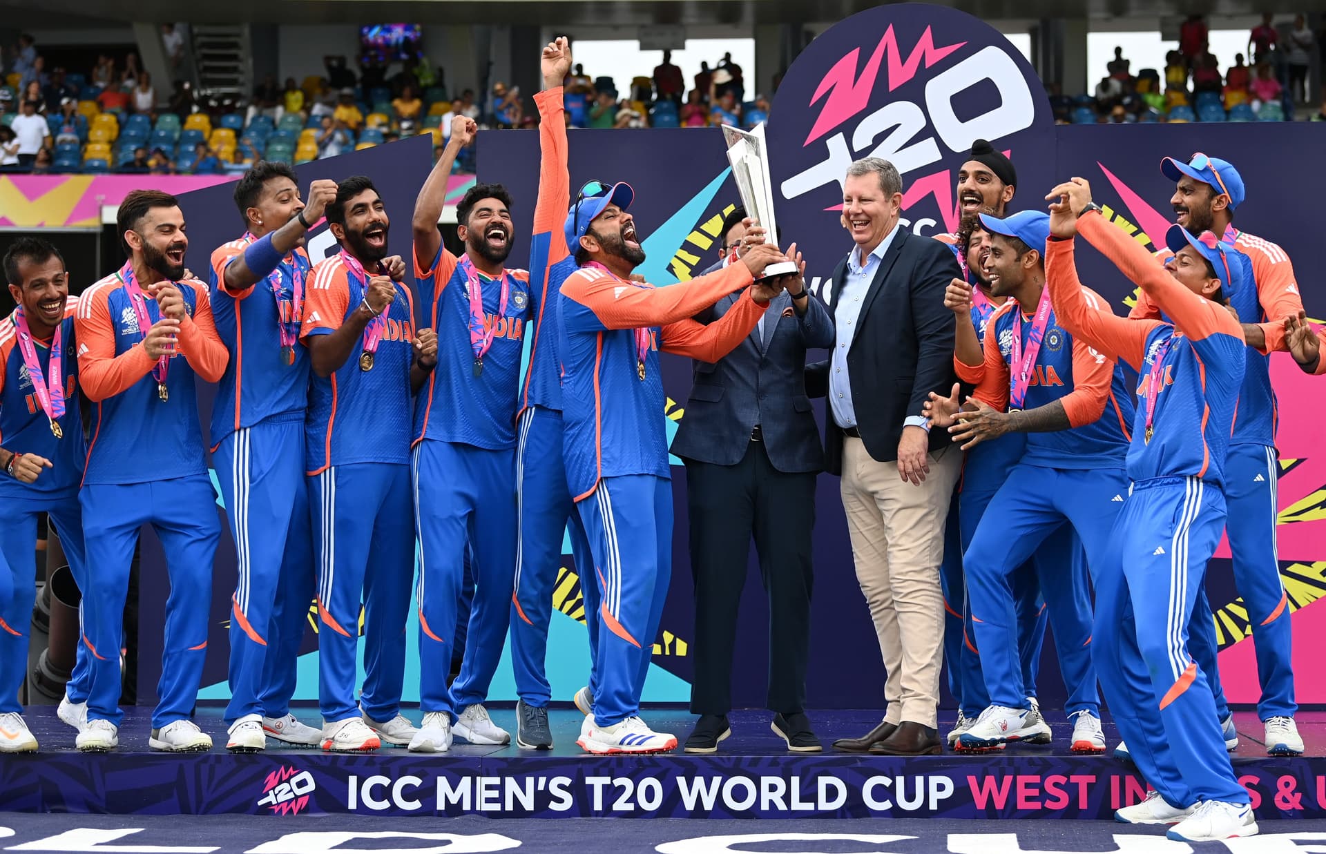 Rohit Sharma of India lifts the ICC Men's T20 Cricket World Cup Trophy