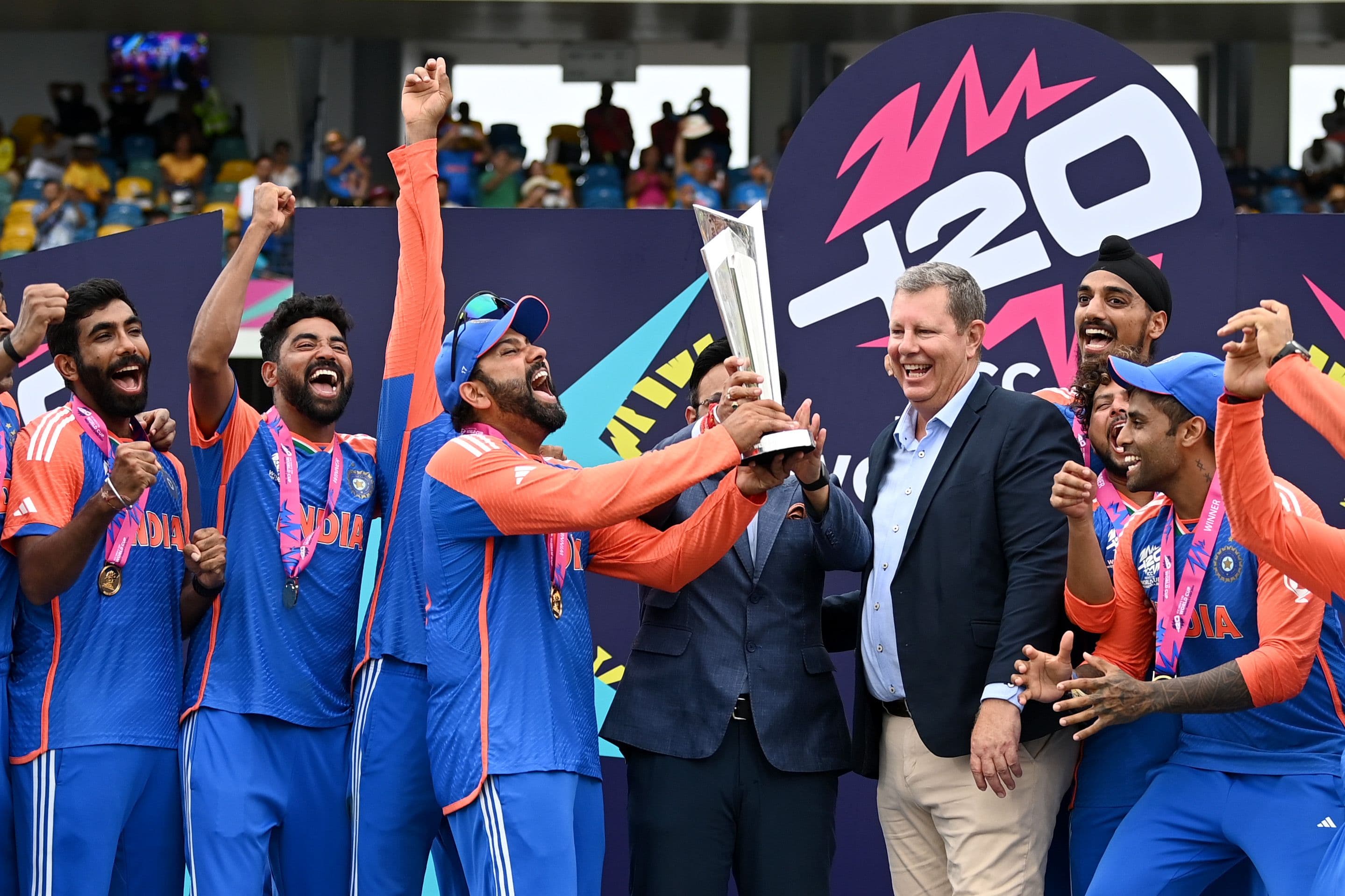 Rohit Sharma of India lifts the ICC Men's T20 Cricket World Cup Trophy f