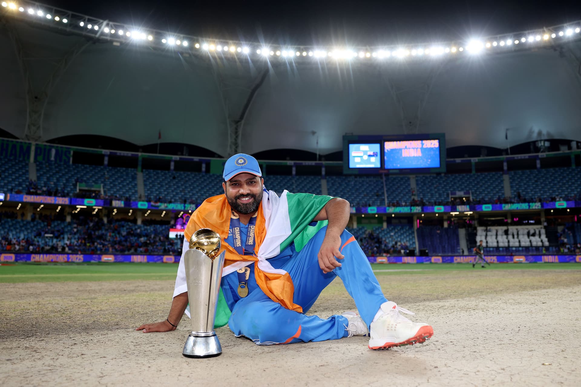 Rohit Sharma of India poses for a photo with the ICC Champions Trophy