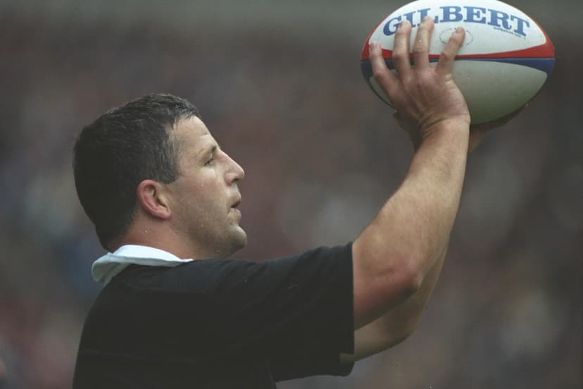 Sean Fitzpatrick of New Zealand prepares the pass in for the line-out