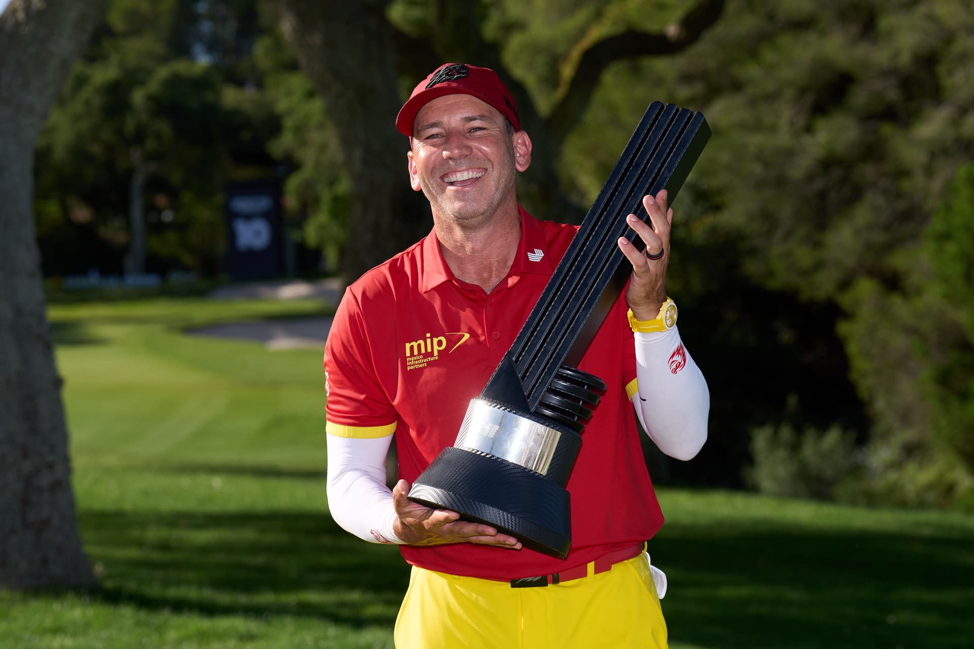 Sergio Garcia of Fireballs GC poses with the trophy after winning the LIV Golf Andalucia
