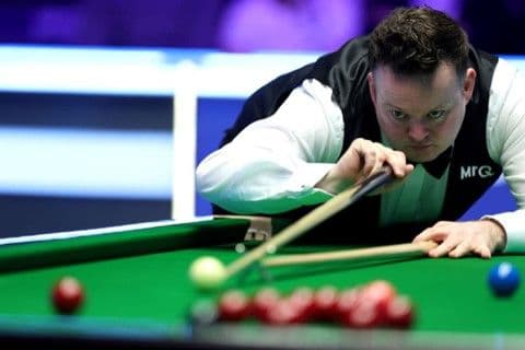 Shaun Murphy making a play during a snooker match