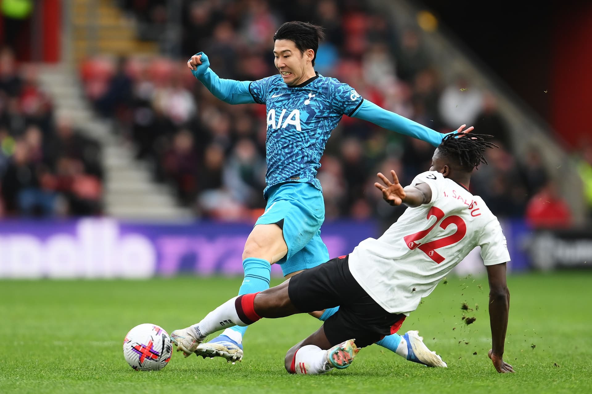 Son Heung-Min of Tottenham Hotspur battles for possession with Mohammed Salisu of Southampton
