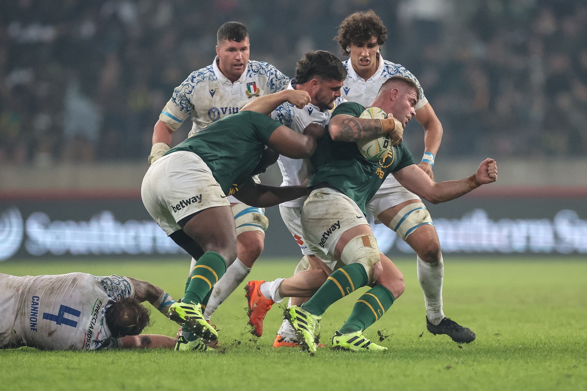 South Africa's Malcolm Marx (R) runs with the ball during the international rugby