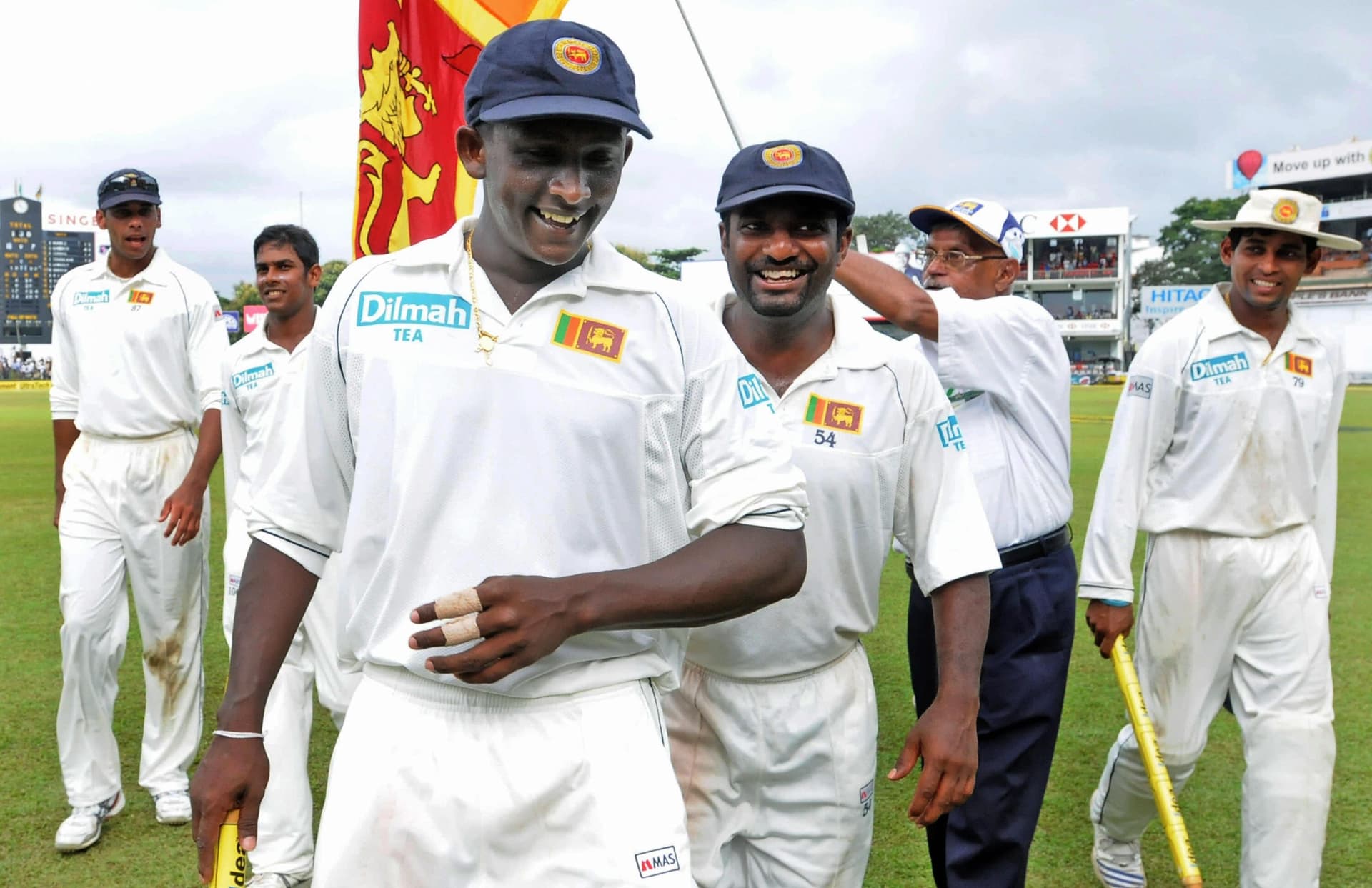 Sri Lankan cricketers Ajantha Mendis and Muttiah Muralitharan