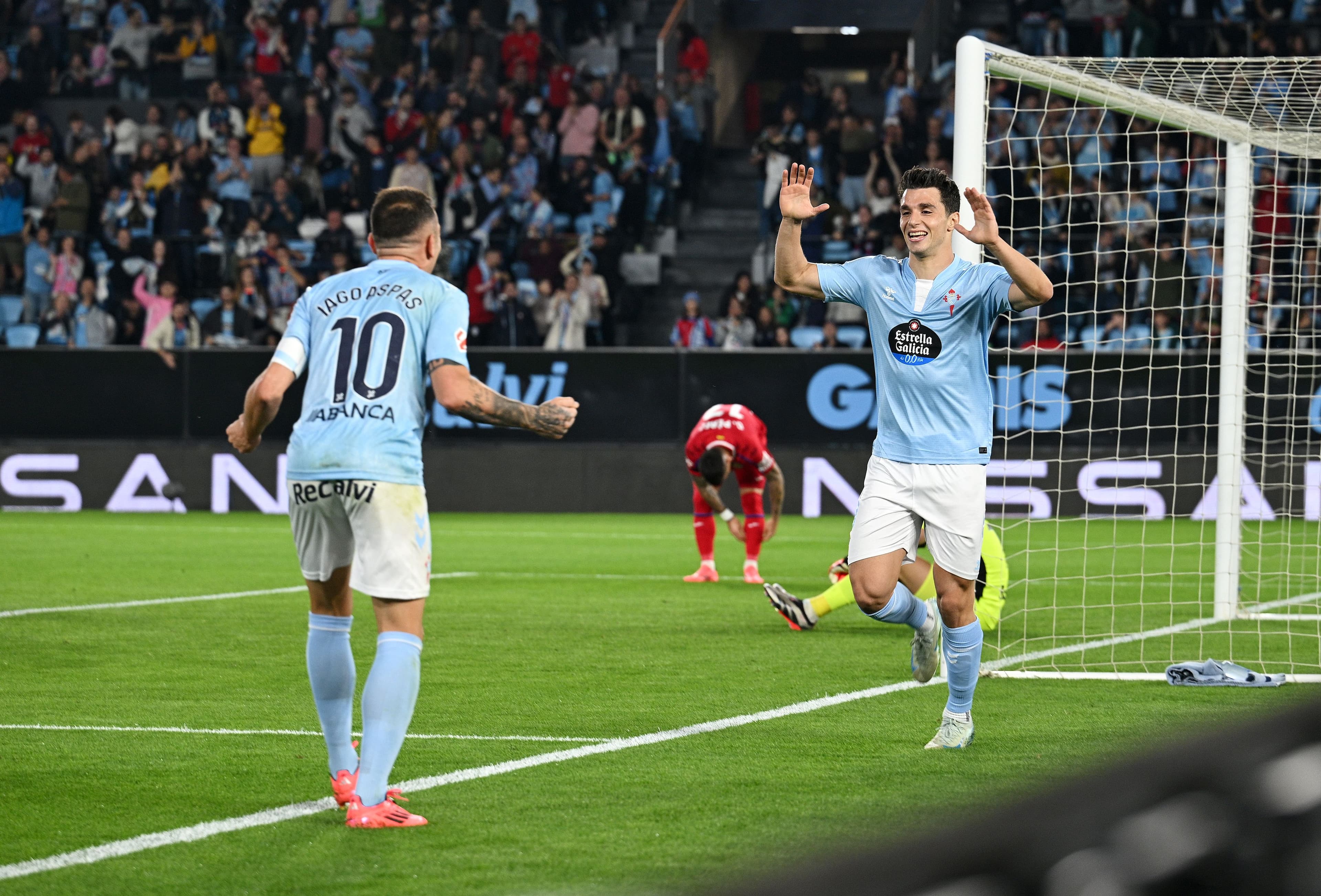 Tasos Douvikas and Iago Aspas