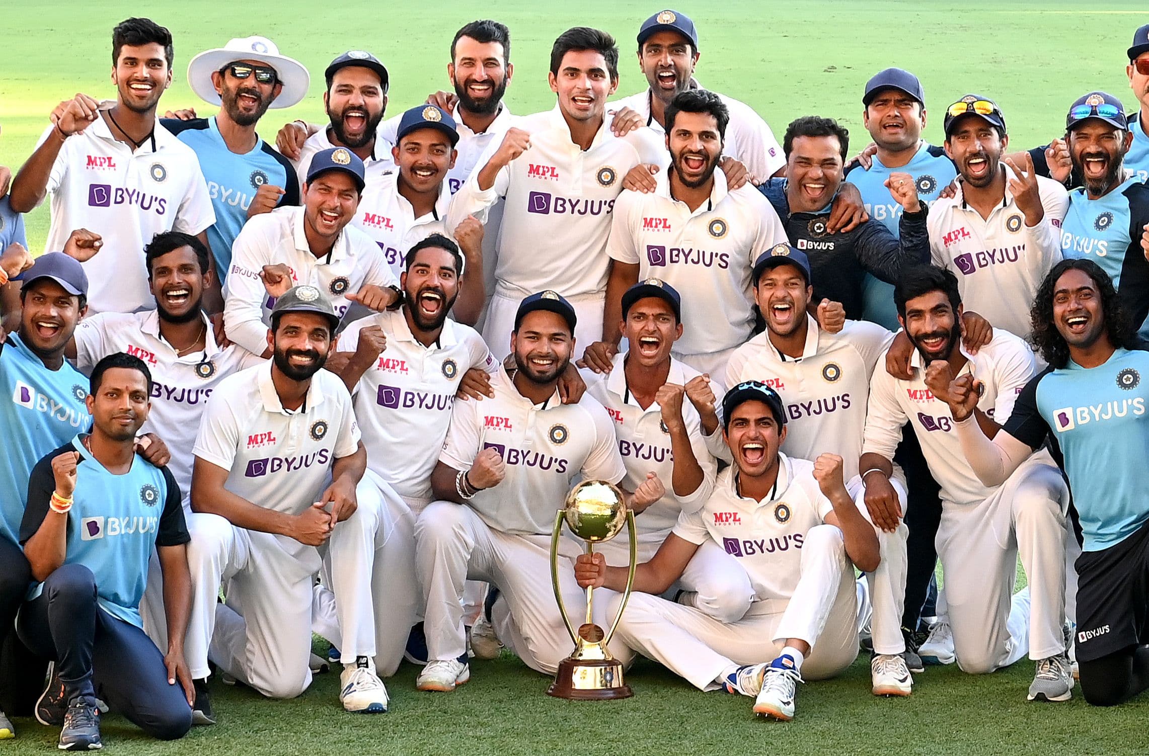 The Indian team celebrates victory after day five of the 4th Test Match in the series between Australia and India