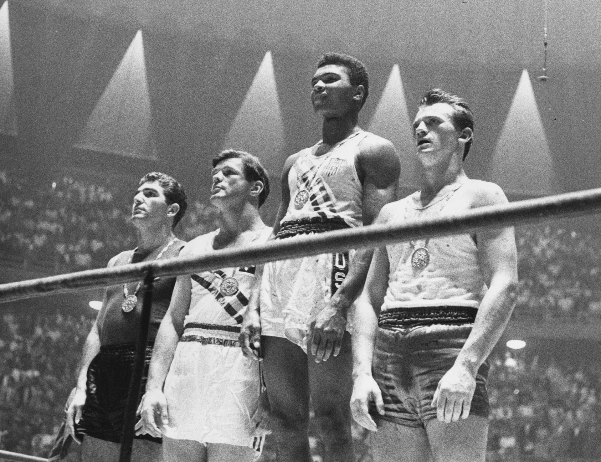 The winners of the 1960 Olympic medals for light heavyweight boxing.jpg