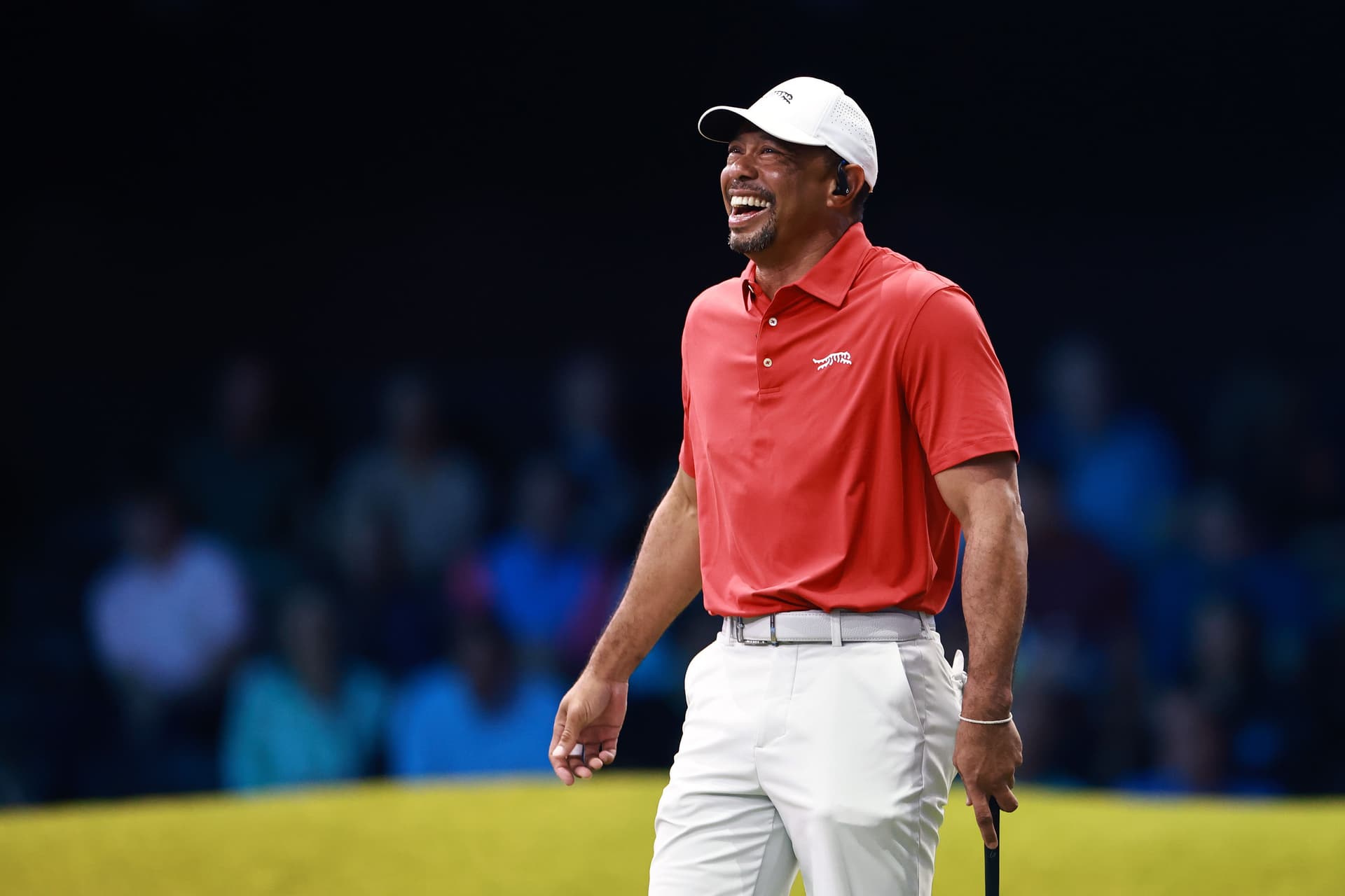 Tiger Woods of Jupiter Links Golf Club laughs during their TGL presented by SoFi match