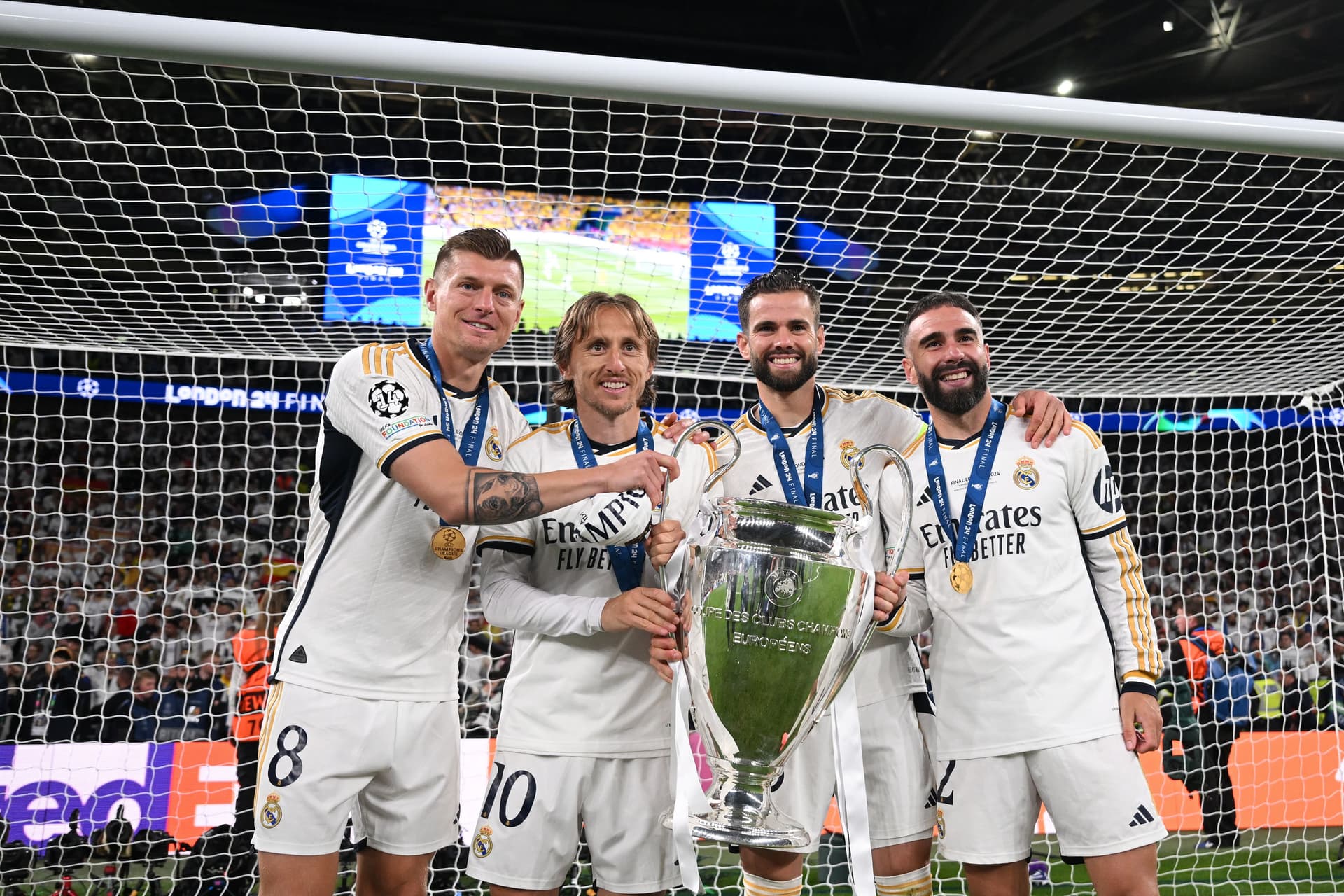 Toni Kroos, Luka Modric, Nacho Fernandez and Daniel Carvajal with UEFA Champions League Trophy