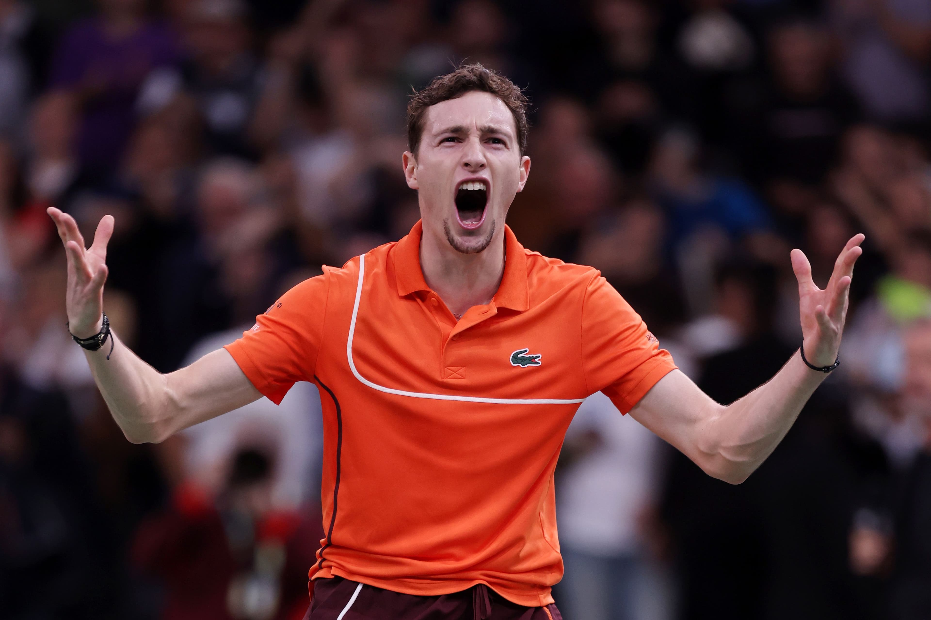Ugo Humbert of France celebrates after winning match point against Carlos Alcaraz
