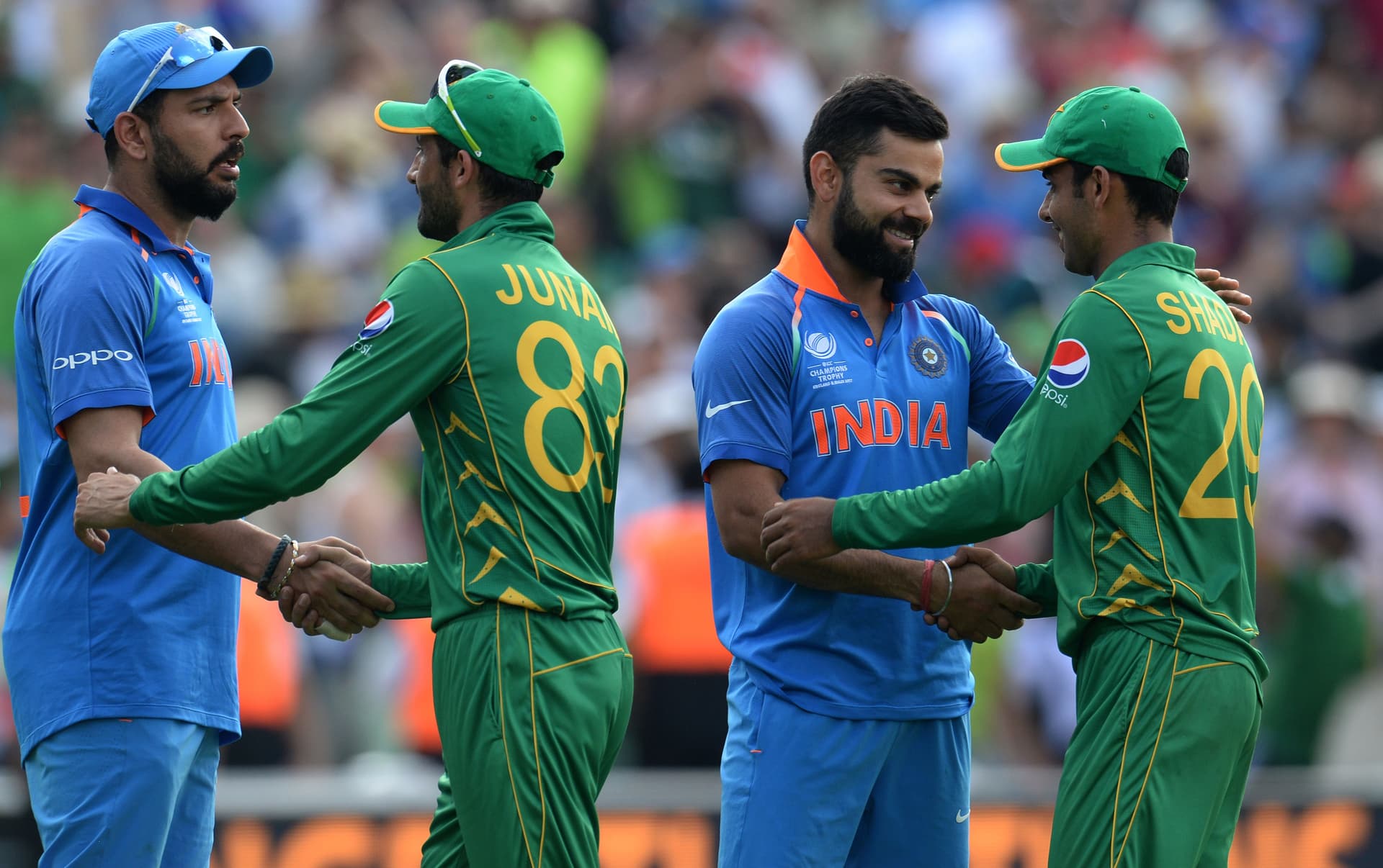 Virat Kohli and Yuvraj Singh shakes hands with Shadab Khan and Junaid Khan