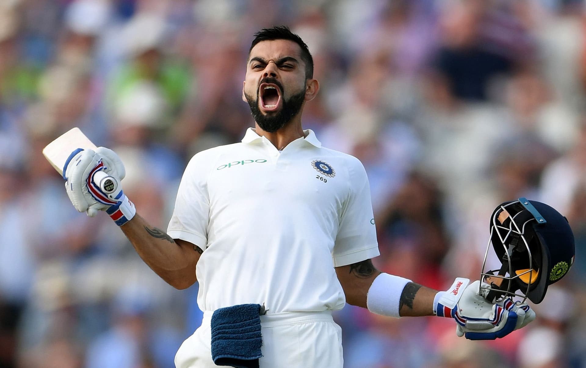 Virat Kohli celebrates his century during day two of the First Specsavers Test Match