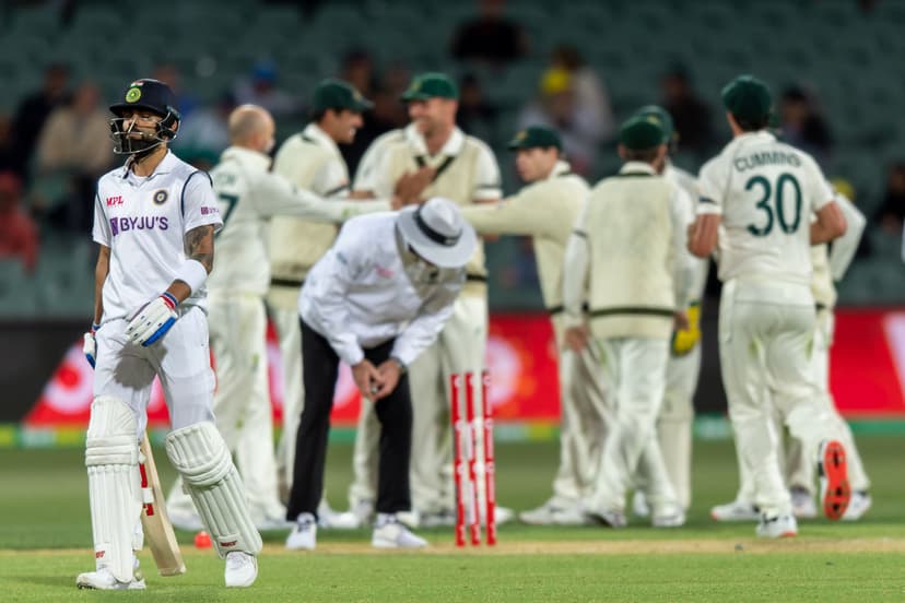 Virat Kohli of India walks off the field after being run-out by Josh Hazlewood of Australia