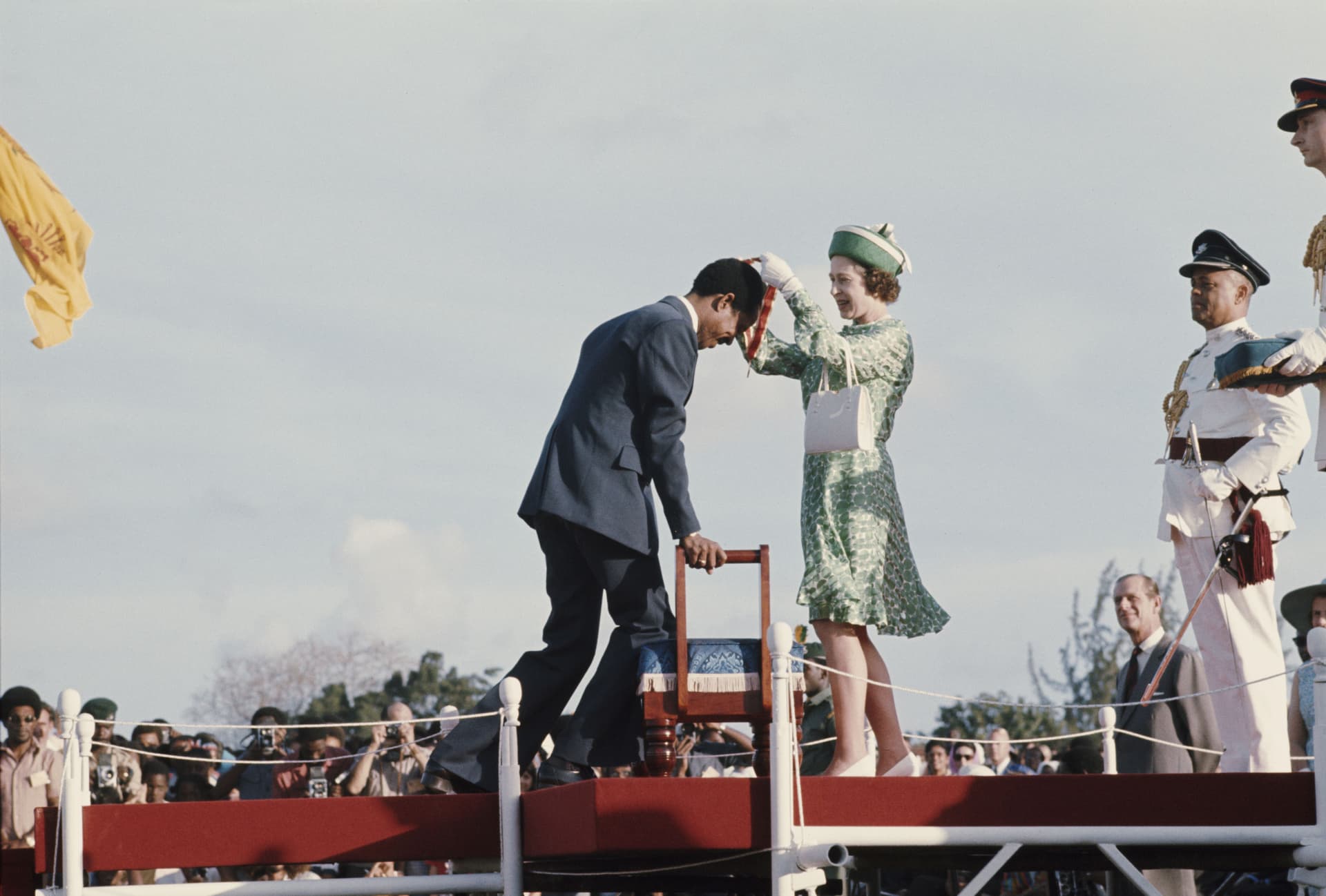 West Indian cricketer Garfield Sobers receives a knighthood from Queen Elizabeth II in 1975