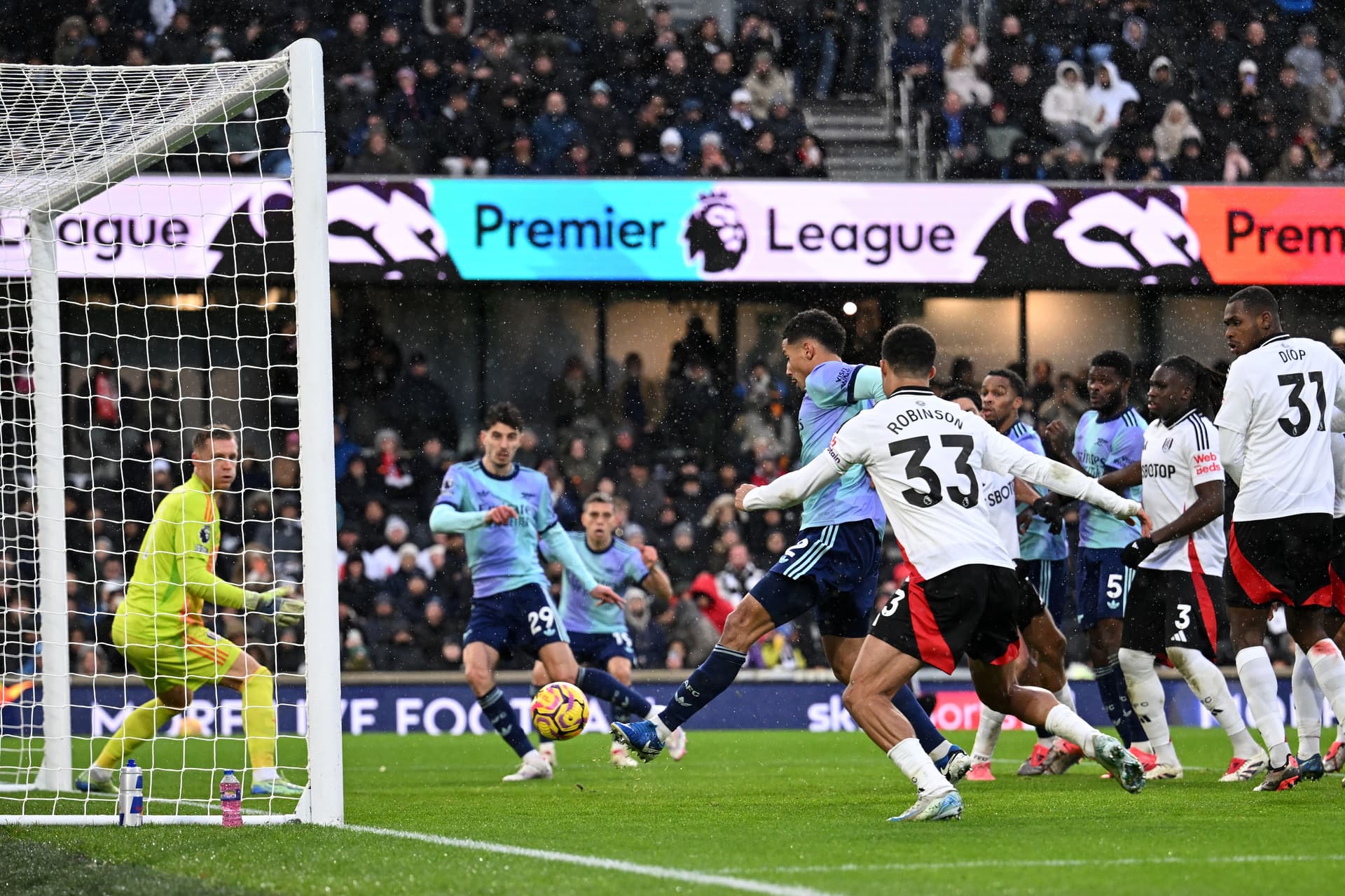 William Saliba of Arsenal scores his team's first goal past Bernd Leno of Fulham
