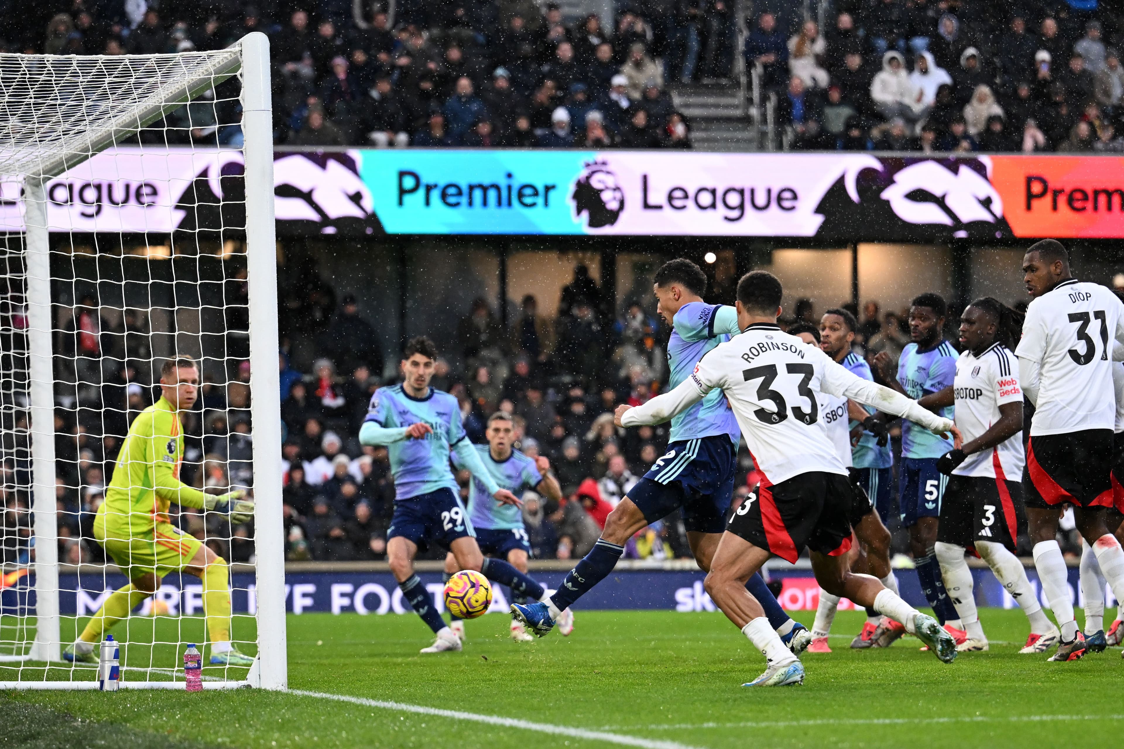 William Saliba of Arsenal scores his team's first goal past Bernd Leno of Fulham