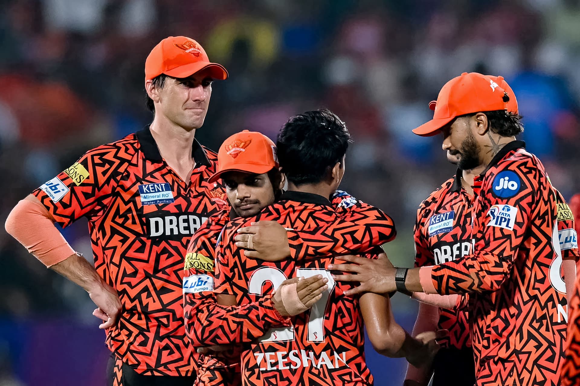 Zeeshan Ansari celebrates with teammates